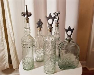 Serving bottles with metal tops