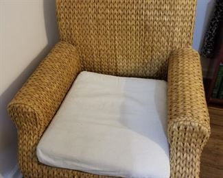Wicker chair, with cushion.