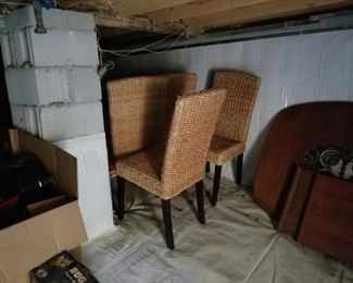Four rattan chairs