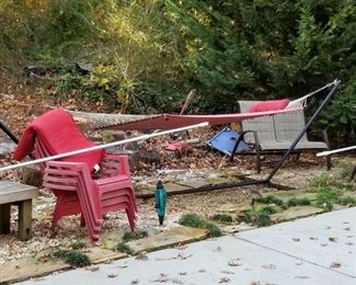 hammock swing along with loveseat chairs and resin red loungers
