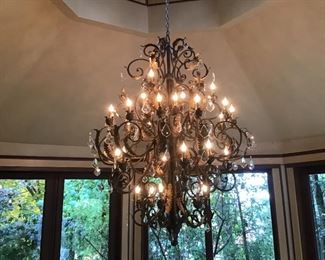 Large wrought iron and crystal chandelier
