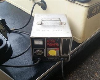 The golf cart comes with this battery charger