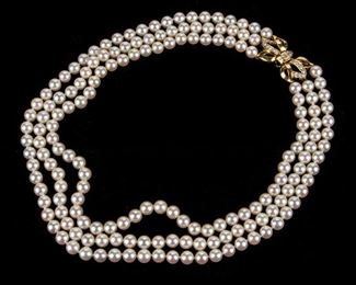 Triple Strand Of Pearls With 18K Gold Clasp