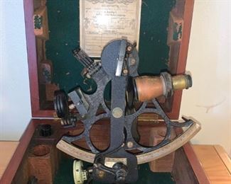 1942 Antique Husun Sextant Made By H. Hughes & Sons LTD. London in Wood Case.  Used for measuring the angular distances between objects and especially for taking altitudes in navigation.