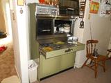 1960's Avocado Green Frigidaire Flair Imperial GE electric range. In MINT condition w/original paperwork. All lights, vents, burners and ovens in excellent working order. 