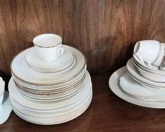 Vintage white dishes, great for the holidays with red decor