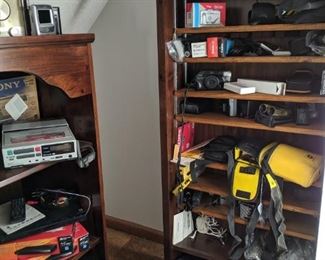 Bookcases and assorted photography equipment