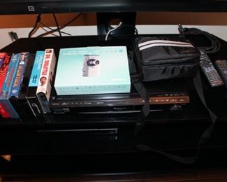 Lots of albums, cd's, vhs and videos in garage