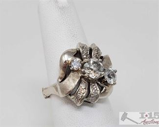 105: 14k Gold Plated Diamond Ring, 8.1g
Weighs approx 8.1g, adjustable band - sizes 6-10 Center Diamond is approx .75ct Marked "14k KB" 
J13 1 of 5