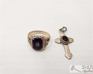 200:Sterling Silver Ring and Pendent
Sterling Silver class ring and cross Pendant Together weighs approximately 11.7g Ring Size approx 9 
J6 1 of 2