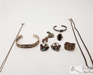 206: Sterling Silver Items
This collection includes vintage screw back earrings, two bracelets, a ring, two Necklaces and more Everything together weighs approximately 88g 
J12 2 of 3