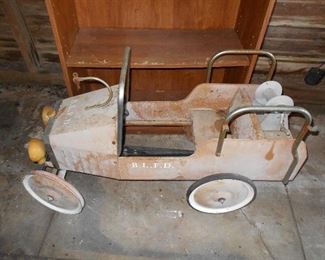 Antique metal fire truck pedal car