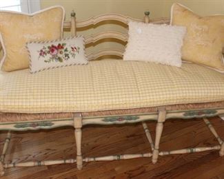 Down filled cushion on woven bottom settee. 