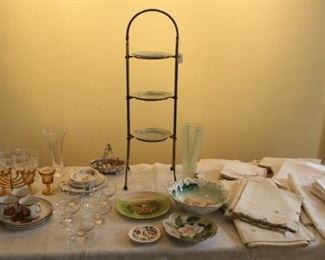 Table is full of exquisite linens and china.  