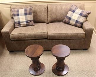 Change out the pillows to cream to lighten this wonderful sofa up. 