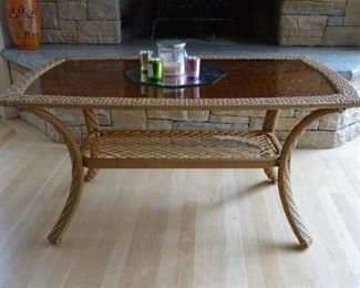 Coffee table with a glass top.