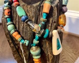 Handmade jewelry from all over the world...these are from Alaska - ivory, bone and real stones!