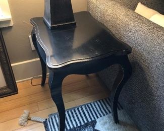 Side, tall black table and lamp
(Rug not included in sale)