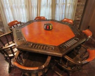 Awesome vintage leather top oak poker table with 7 seats.