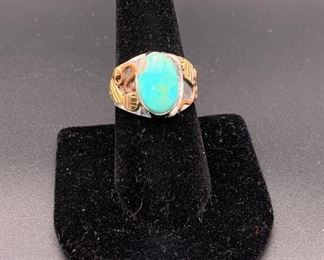 Newer sterling silver and turquoise ring with copper and brass accents, Native American