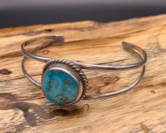 Vintage sterling silver cuff bracelet with turquoise centerpiece, Native American Navajo