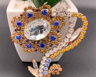 Czech rhinestone flower with curved stem pin