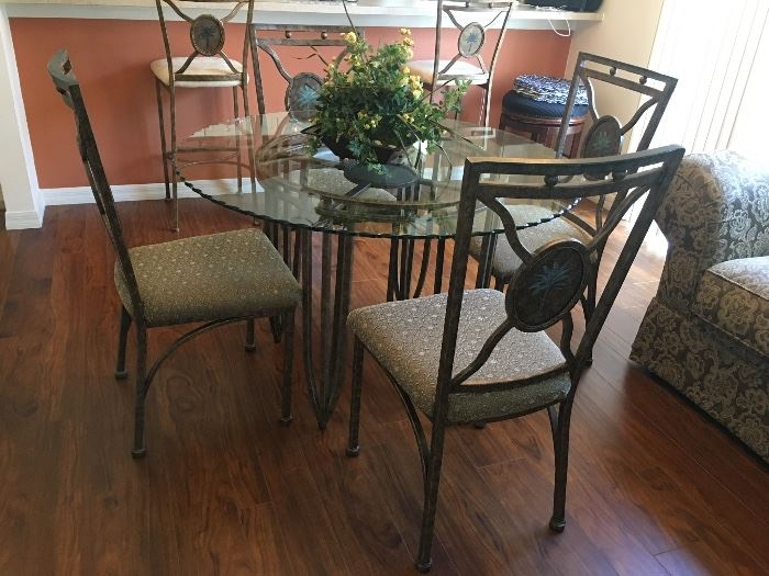 Glass Topped Dining Table. $450.00
