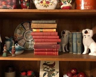 Antique books, various tins, crocks, Staffordshire dogs