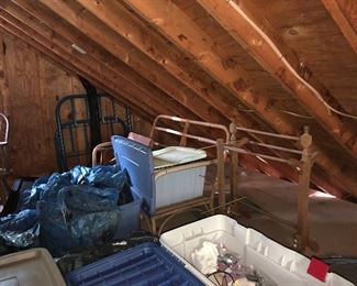 rattan love seat, quilt rack, metal twin bed