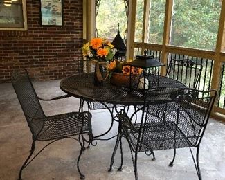 Wrought iron table and 4 chairs