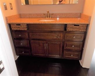 Bathroom vanity with granite top , sink and faucet