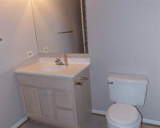 Powder room vanity strip lights toilet