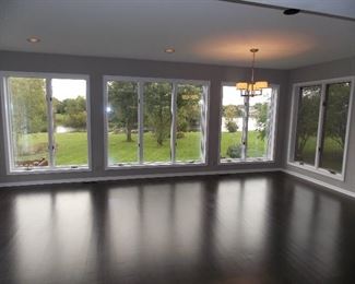 Pella Windows Reclaimed Oak wide plank floors light fixture
