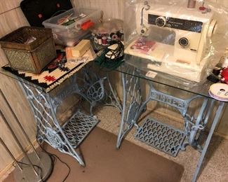 TYPEWRITER, SEWING SUPPLIES AND TWO VINTAGE SINGER SEWING MACHINE STANDS