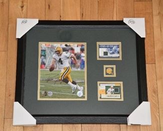 Brett Farve signed photo tribute with collectible jersey cards and authenticity.
