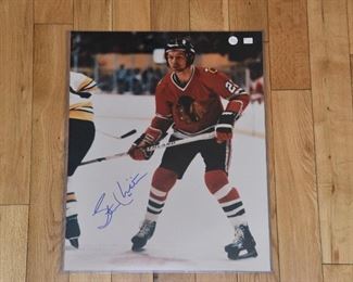 Stan Mikita signed 16x20 photo with authenticity.