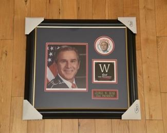 George W Bush signed photo with campaign memorabilia and authenticity.