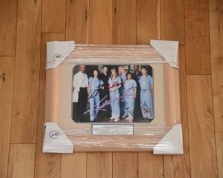 Grey's Anatomy autographed cast photo with authenticity.