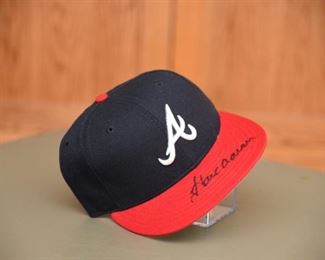 Hank Aaron signed Braves hat with authenticity.