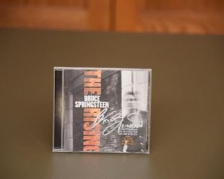 Bruce Springsteen signed CD with authenticity. 