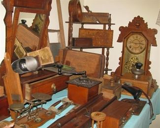 Wooden ware that includes Mutual telephone company wall phone, cigar molds, shaving mirror.
