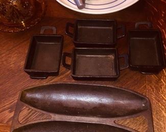 Iron French Bagette bread molds. 