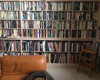 Just one wall of the personal Library of an avid collector. 