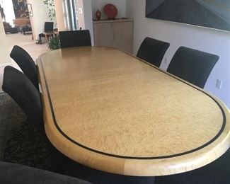Contemporary style dining table. Expands from  7’ to 10’ long.