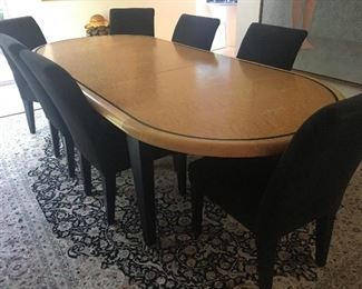 The dining table with one leaf in place. 