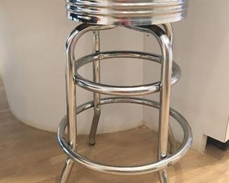 Chrome and leather bar stools. 