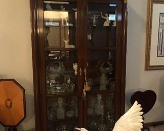 Another Two Door Cabinet - that is a Lladro Goose taking flight peaking out