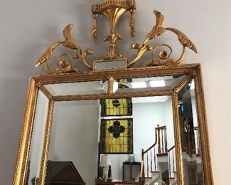 Wall Mirror with view of stained panels