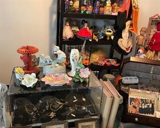 Capodimonte' porcelain flowers, older pictures in metal frames, Alexander dolls, Fisher Price Fire House, School House and Airplane, NIB Halloween Peanuts, loose Good Ol' Boy Charlie sets, Mrs Beasley dolls