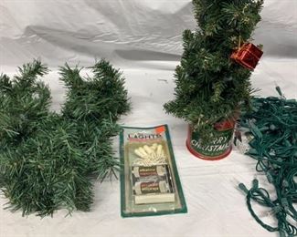 Miniature Christmas tree, white lights, and tree